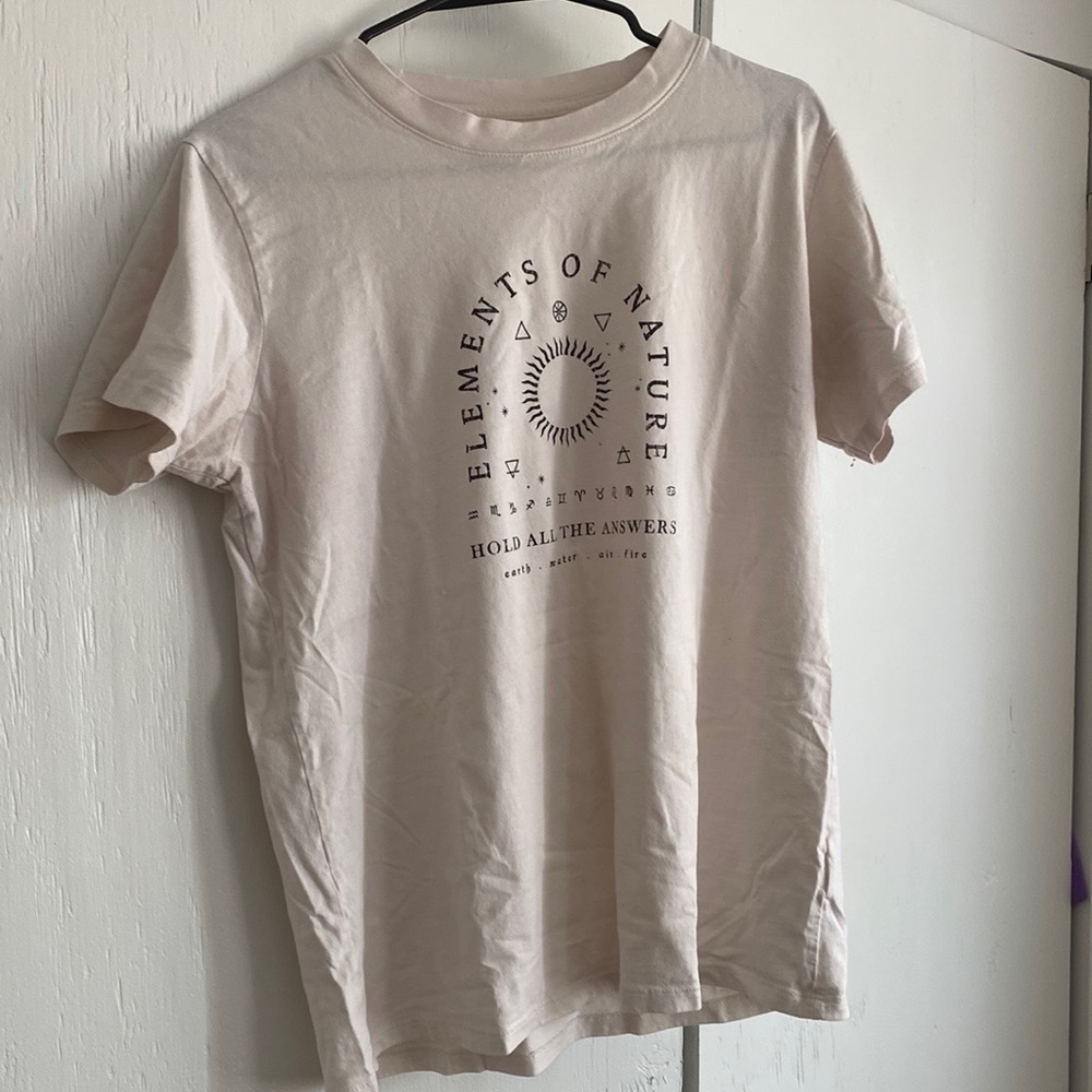 Cream colored graphic tee from cotton on.